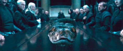 nagini_at_malfoy_manor_dining_table.jpg